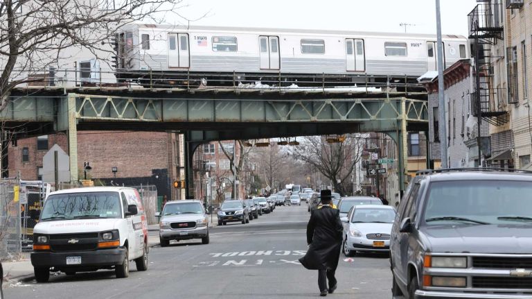 The D train as it passes 47th street and New Utrecht Ave, in Borough Park, Brooklyn, Sunday, Mar. 16, 2014. Borough Park is a predominately Orthodox Jewish neighborhood in central, Brooklyn.
