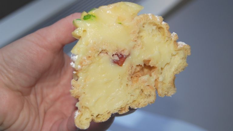 Zeppoles vs. Sfincis: Which Italian pastry are you? 18 Just look at how much luscious custard fills this zeppole. This is no joke.