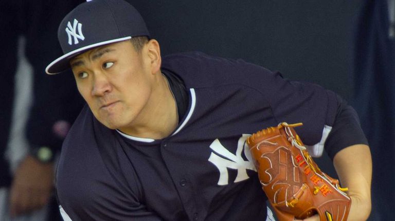 Yankees' Masahiro Tanaka works out at Steinbrenner Field in Tampa, Fla. on the morning of Feb. 15, 2014.