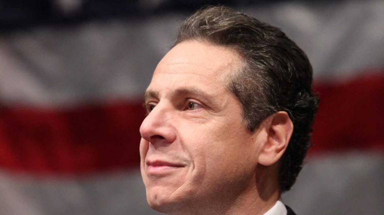 Gov. Andrew M. Cuomo speaks before Nassau County Executive Edward Mangano is sworn into office for his second term by Supreme Court Justice Thomas Feinman at Bethpage High School in Bethpage. (Jan. 2, 2014)