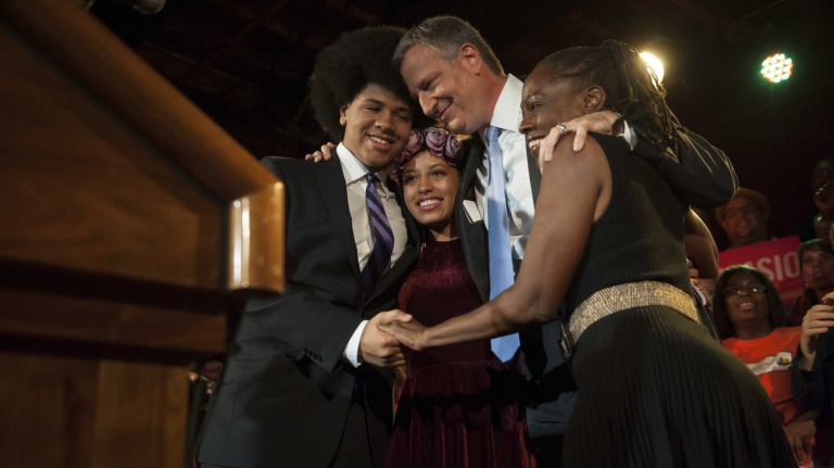 Democratic mayoral candidate Bill de Blasio celebrates at The Bell House with his wife Chirlane McCray, daughter Chiara de Blasio, son Dante de Blasio, after election results show him placing first in the primary election. (Sept. 10, 2013)