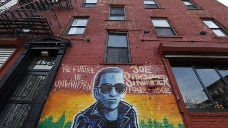 Mural of Joe Strummer on wall of Niagara Bar at the corner of Ave. A and 7th street.