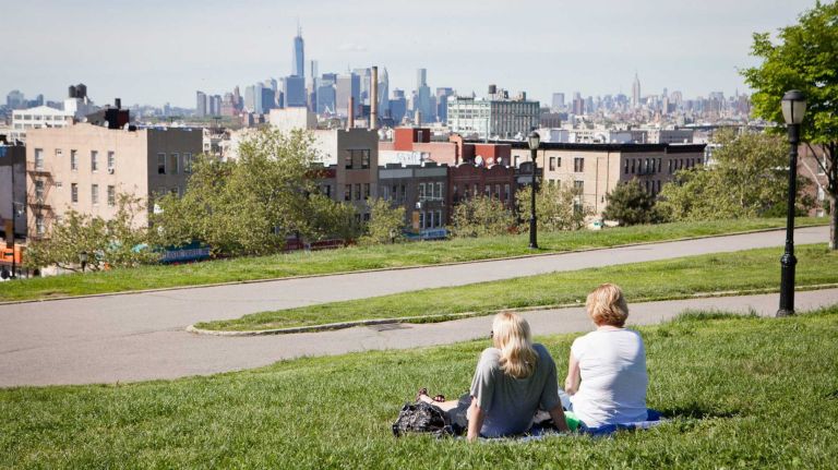 The Manhattan skyline can be seen from Sunset Park.