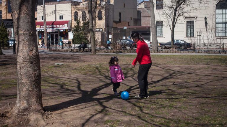 Visitors play ball at Tappen Park in the St. George/Stapleton neighborhood. (Mar. 30, 2013)