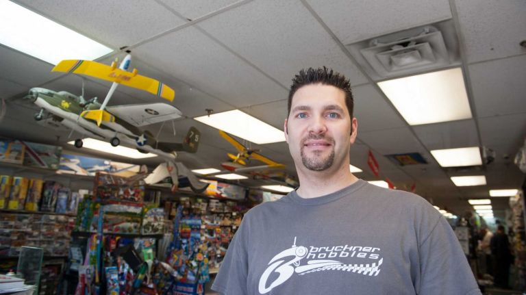 Daniel Baffer, 34, runs his father's store, Bruckner Hobbies, located along E. Tremont Avenue.