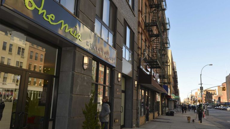 This is a view from the vibrant business district along Frederick Douglass Boulevard at West 114th Street in South Harlem.