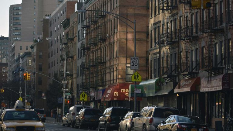 This is a view from the vibrant business district along Frederick Douglass Boulevard at West 114th Street in South Harlem.
