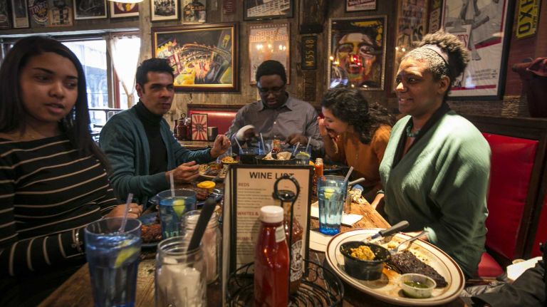 Staff members of a local arts nonprofit at Dinosaur Bar-B-Que. (Jan. 6, 2014)