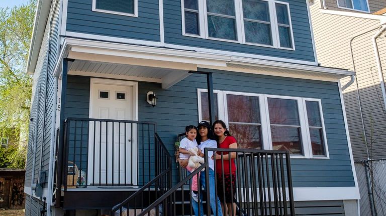 Years after Sandy, Staten Island family finally gets new home through Build It Back 1 Nathalie Balderas, 4, left, and Veronica and Evelia Balderas, on the steps of their newly built modular home in South Beach on Wednesday.