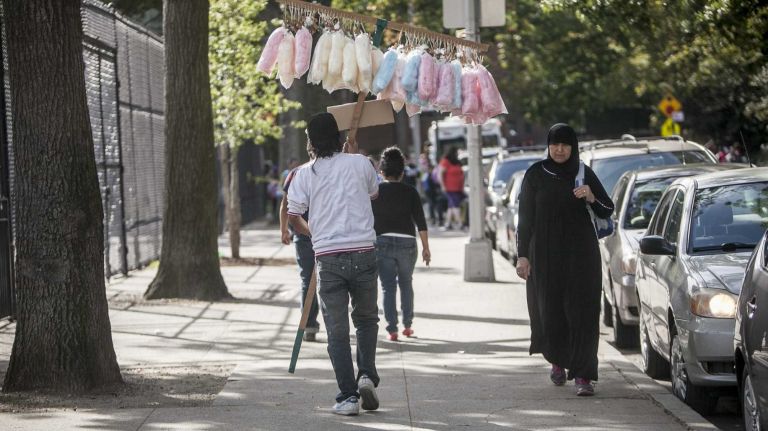 Alex Garcea sells cotton candy to schoolkids.