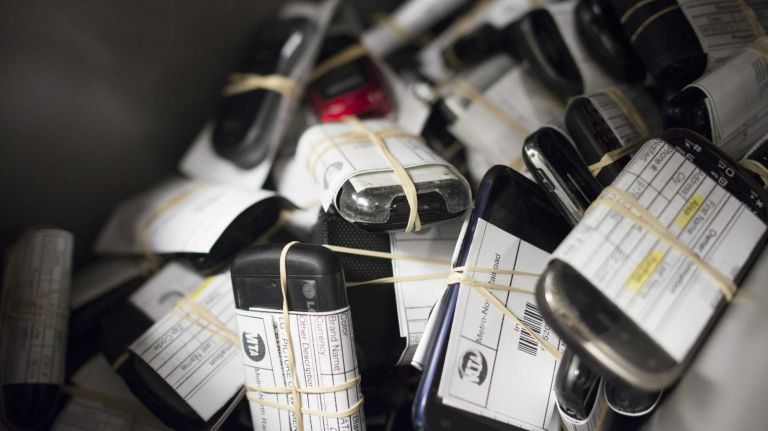 Lost cell phones are stored at the MTA's Metro-North Railroad Lost & Found in Grand Central Terminal on August 28, 2013.