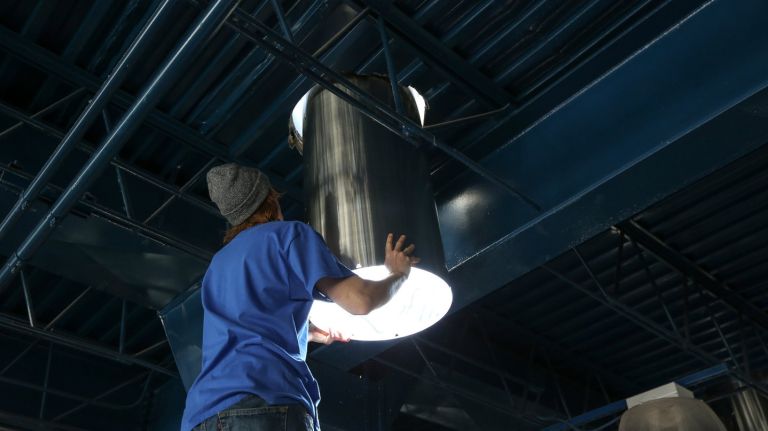 Queens business helps Sandy-struck shops capture natural light 1 Mike Shea installs Solatubes at Burn Fitness in Rockaway.