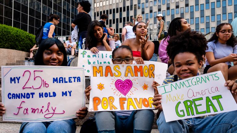 Protesters demonstrate Thursday at Federal Plaza in support of immigrants and ask New Yorkers to bring one item they would pack if they faced deportation.