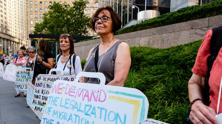 Protesters demonstrate at Federal Plaza.