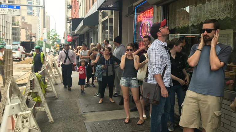 Glaser's Bake Shop attracts lines of sad New Yorkers looking for their last bite 5 A long line outside Glaser's Bake Shop, where loud Con Edison work is also going on.