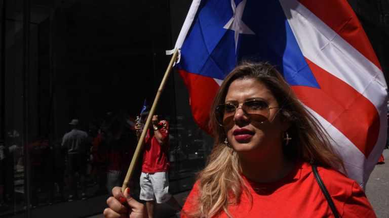 A participant marches on Fifth Avenue during the 60th annual Puerto Rican Day Parade on Sunday, June 11, 2017. 