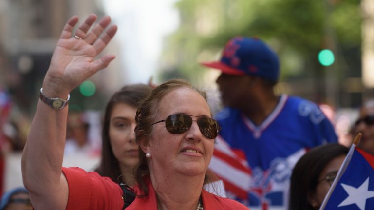 Manhattan Borough President Gale Brewer marches in the 60th annual Puerto Rican Day Parade in Manhattan on Sunday, June 11, 2017. 
