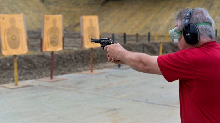 NYPD Lt. James Darcy fires a .38 revolver during a demonstration of the firearm at Rodman's neck gun range in the Bronx on May 30, 2018, not long before training on his new 9mm firearm as he prepares to retire his revolver.