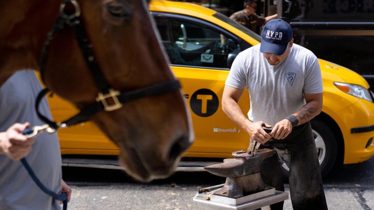 While working out of a mobile workshop, Martinez begins to mold the shoe for Centennial.