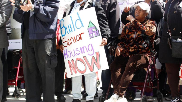 Hundreds of NYCHA tenants gathered Tuesday to demand Mayor Bill de Blasio allot $2.5 billion for NYCHA repairs and development.