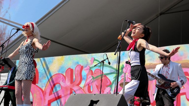 The group Gaijin à Go-Go performs on the Cherry Esplanade stage.