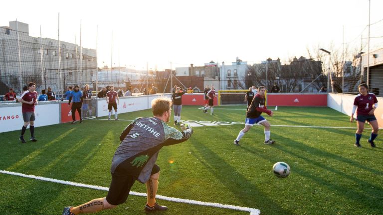 Teams compete at the Upper 90 rooftop soccer field in Astoria.