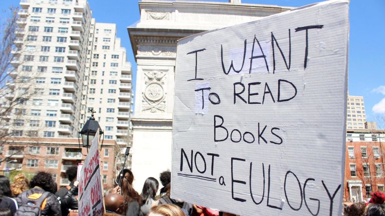 NYC students join National School Walkout against gun violence on Columbine anniversary 2 Students held signs against gun violence at a rally Friday at Washington Square Park as part of the National Student Walkout.