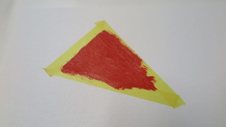 Step-by-step instructions on how to paint perfect shapes 11 Finally, you can get some paint on the canvas. Make sure to stay within the tape.