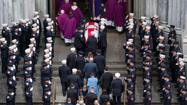The casket is walked into St. Patrick's Cathedral on Tuesday.
