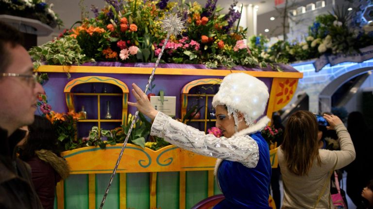 Macy’s Flower Show creates a fairy tale of flowers 11 A performer walks past
