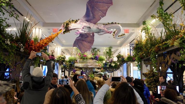 Macy’s Flower Show creates a fairy tale of flowers 12 A dragon breathes fire made from flowers above the visitors.