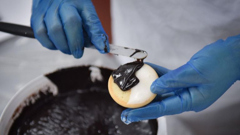 Laura Jaramillo puts icing on the black and whites.