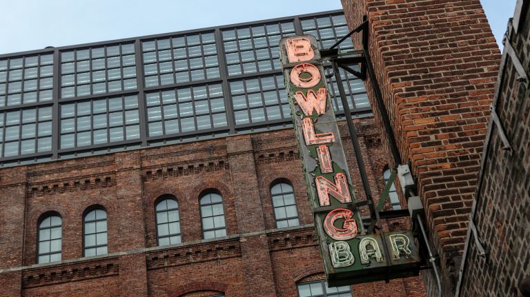 Inside Brooklyn Bowl music venue: See photos 10 The building that houses Brooklyn Bowl was formerly an ironworks-foundry building in the 1880s.