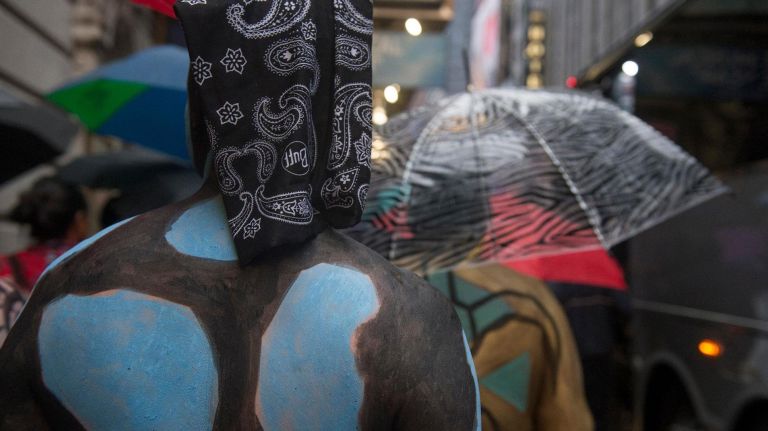 Photos: Body painting event in Times Square turned heads 10 Models walk toward Times Square during a Polar Bear Paint event in Manhattan on Saturday, Feb. 10, 2018.
