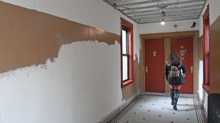 Bronx landlord accused of neglecting tenants: Photos 11 Lisa Ortega enters her apartment which shows unfinished walls and ceiling on Thursday, Feb. 1, 2018.
