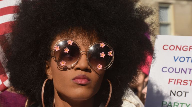 Women's March on NYC: Photos of the 2nd annual demonstration 28 A woman participates in the Women's March on Jan. 20, 2018, in Manhattan.