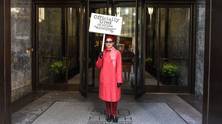 Women's March on NYC: Photos of the 2nd annual demonstration 30 A woman stops for a photo near Bryant Park during the Women's March in Manhattan on Jan. 20, 2018.