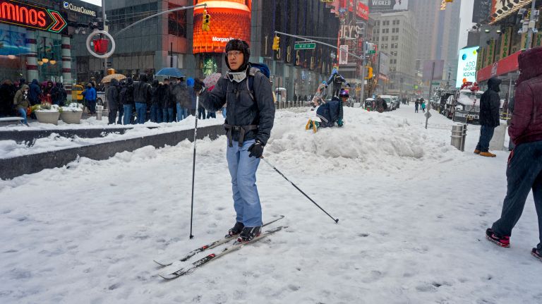 Snow in NYC: Photos from winter 2016-2017 41 A cross-country skier who lives in nearby Hell's Kitchen makes his way through Times Square during the snowstorm Tuesday, March 14, 2017, in Manhattan.