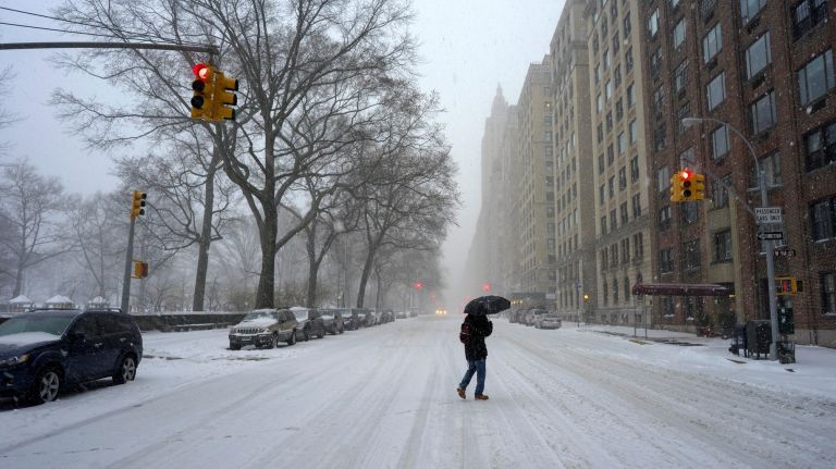 Snow in NYC: Photos from winter 2016-2017 49 A pedestrian moves along Central Park West during the snowstorm on the Upper West Side of Manhattan on Tuesday, March 14, 2017.