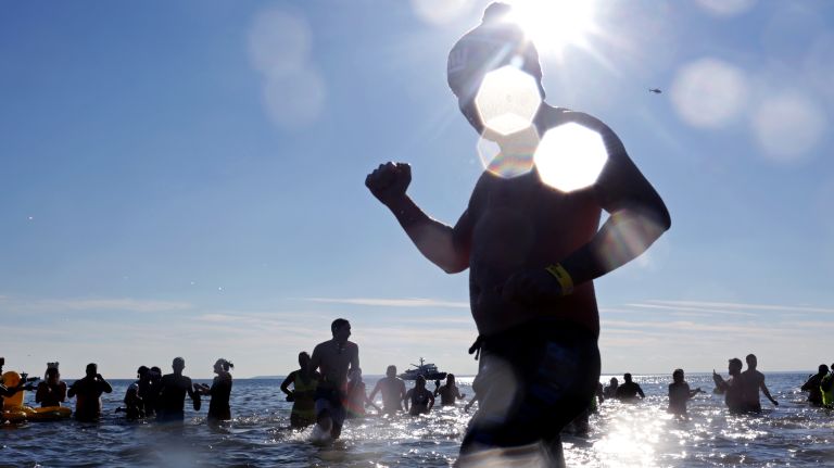 Swimmers participate in the Coney Island Polar Bear Club's New Year's Day Swim on Jan. 1, 2017.