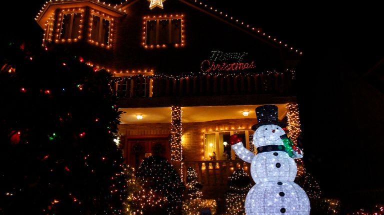 Dyker Heights Christmas lights photos: Best and brightest holiday decorations 16 A conventional, yet effective take on Christmas brings holiday cheer to passers-by, checking off all the right holiday themes: a snowman, a welcoming