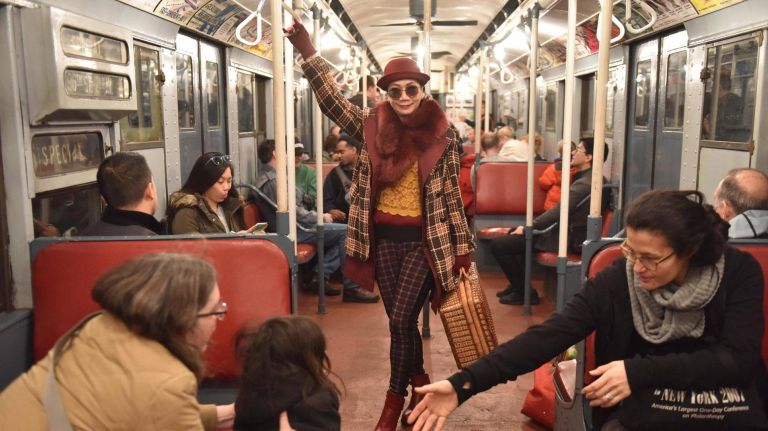 MTA's Holiday Nostalgia Train makes its annual debut: See photos 11 Rider Sharon Lee really got into the spirit of the season.