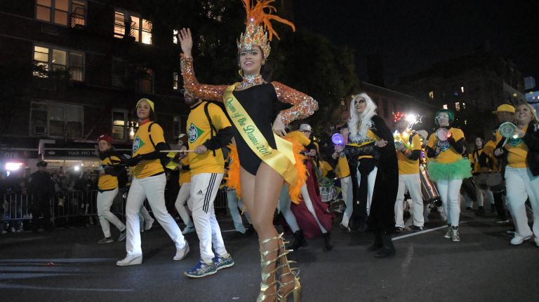Village Halloween Parade photos highlight city's spookier side 34 Parade marchers travel up Sixth Avenue in the 44th annual Village Halloween Parade in Manhattan, Tuesday, Oct. 31, 2017.