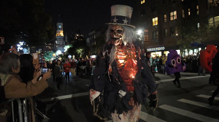 Village Halloween Parade photos highlight city's spookier side 40 Parade marchers travel up Sixth Avenue in the 44th annual Village Halloween Parade in Manhattan, Tuesday, Oct. 31, 2017.