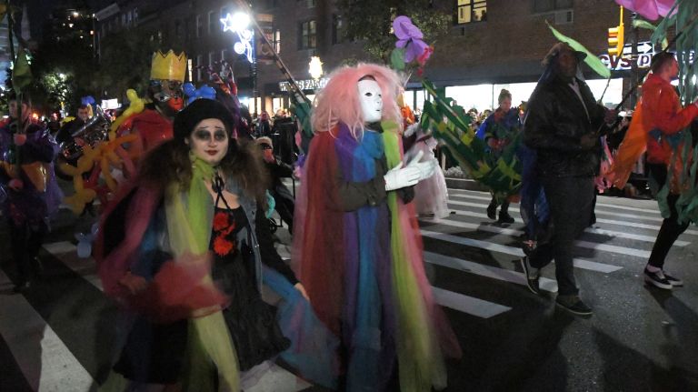 Village Halloween Parade photos highlight city's spookier side 41 Parade marchers travel up Sixth Avenue in the 44th annual Village Halloween Parade in Manhattan, Tuesday, Oct. 31, 2017.