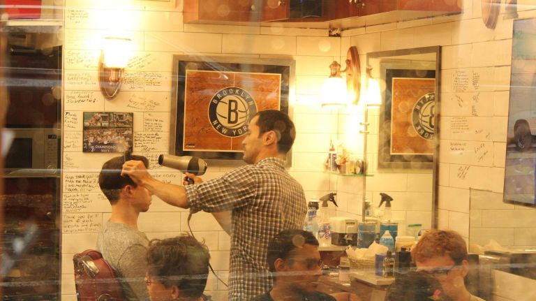 Brooklyn Heights: What to do and where to eat in Truman Capote's neighborhood 17 You may already have your go-to barber or stylist, but if you're in the neighborhood why not get cleaned up a little? The staff at family-owned Clinton Street does things the old-fashioned way, complete with the straightedge razor and warm towel treatment. Plus, you just can't beat the rates: $8 for a shape-up, $20 for a fade and $33 for a women's haircut. Plus they throw in complimentary coffee and snacks. If you've had a long day, ask for a cold beer. They'll hook you up. (104 Clinton St.)