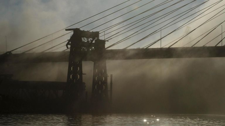 Old Kosciuszko Bridge finally comes down: See photos 14 Smoke rises as sections of the old Kosciuszko Bridge are demolished using a process called energetic felling on both the Queens and Brooklyn sides of the Newtown Creek, Sunday,Oct. 1, 2017. The energetic felling required the placement of little charges at key joints on the bridge so that when the charges went off, the bridge broke apart and fell directly down.