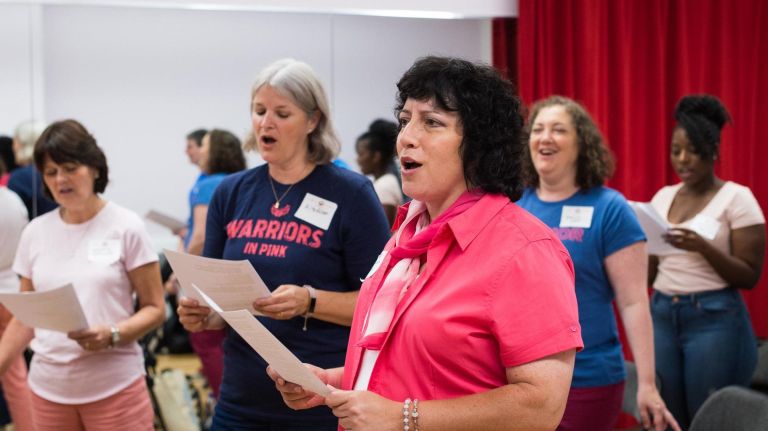 Cancer patient Lori-Ann Urbanski, center, and the rest of the group tried singing without taking any breaths -- which, yes, was as hard as it sounds.