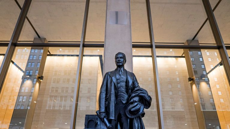 Penn Station's history is hidden in plain sight 11 The statue of Samuel Rea, who helped lead the construction of Penn Station, stands today facing Seventh Avenue above Penn Station on the plaza in Manhattan, Thursday, July 27, 2017. Rea's statue, which once stood inside the grand arcade passenger area of Penn Station, is an element that connects today's commuters to the beloved McKim, Mead & White Beaux-Arts structure, torn down in 1963, that to this day is missed by commuters and visitors to the modern Penn Station.