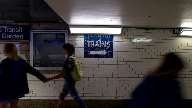 Penn Station's history is hidden in plain sight 19 In a hallway at the far east edge of Penn Station in Manhattan, an old painted direction sign, partially covered by a light fixture, still points the proper direction to trains Thursday, July 27, 2017. The sign also, in part, refers to the Pennsylvania Rail Road, which has long since left the station.